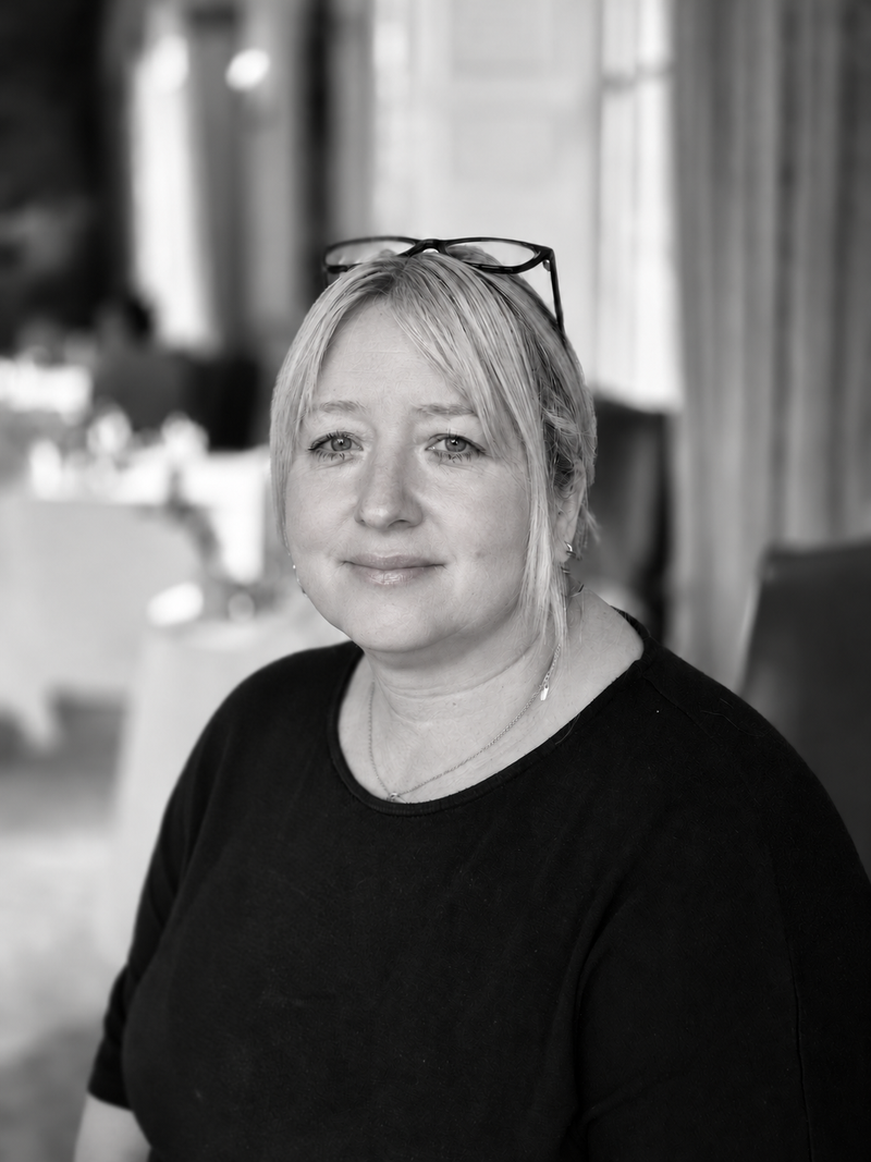 Black-and-white portrait of Nicola, founder of Rubdub